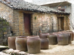 huge storage pots s are all over the village - for rice? fermented something?